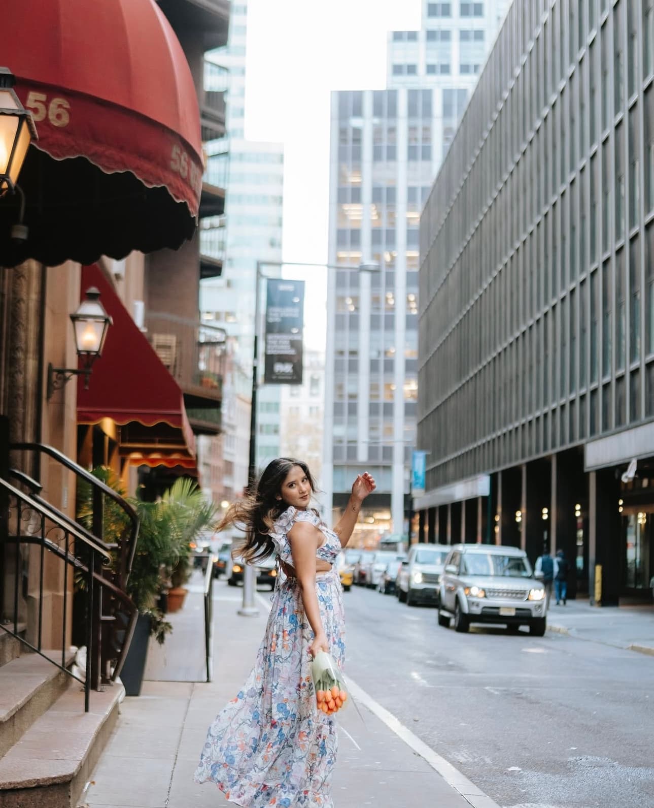 Maitreyi Tiwari holding flowers in New York